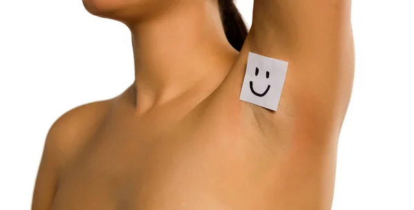 Woman Shows Her Underarm Smiling Face Her White Background — Stock Photo, Image