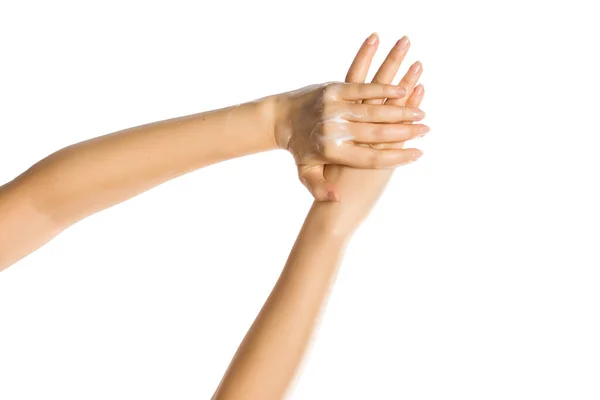 Nahaufnahme Weiblicher Hände Beim Auftragen Von Handcreme Auf Weißem Hintergrund — Stockfoto
