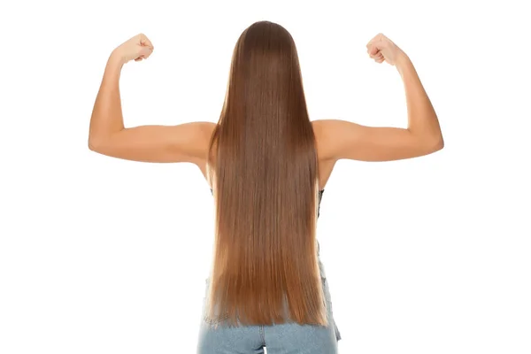 Zadní Pohled Mladou Ženu Velmi Dlouhými Vlasy Ukazující Její Ruce — Stock fotografie
