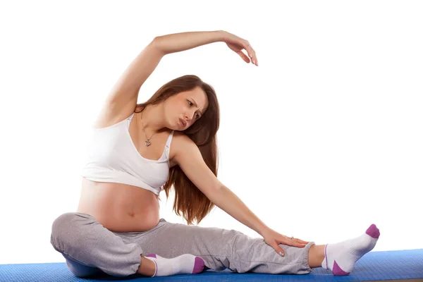 Беременная Женщина Делает Упражнения Белом Фоне — стоковое фото
