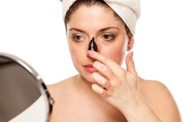 Young Beautiful Woman Towel Her Head Applying Black Mask Her — Stock Photo, Image