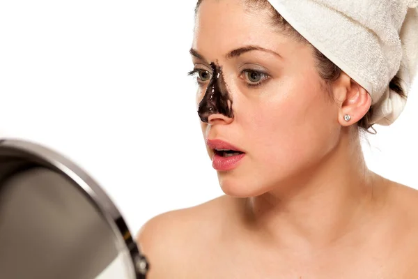 Young Beautiful Woman Towel Her Head Applying Black Mask Her — Stock Photo, Image