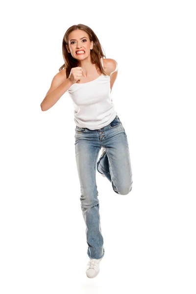Jeune Jolie Femme Courir Bas Cloche Jeans Sur Fond Blanc — Photo
