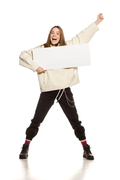 Young Happy Model Hoodie Holding Empty Advertising Board White Background — Stock Photo, Image