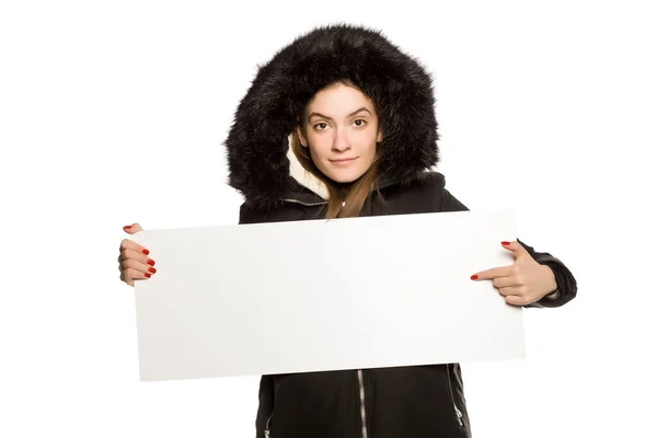 Young Model Winter Jacket Hood Shows Empty Advertising Board White — Stock Photo, Image