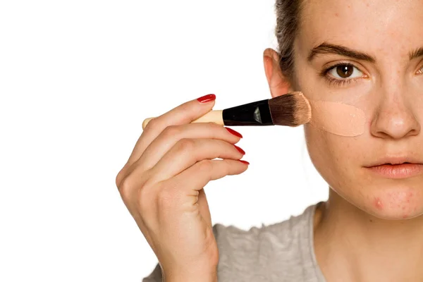 Young Woman Problematic Skin Applying Liquid Foundation White Background — Stock Photo, Image