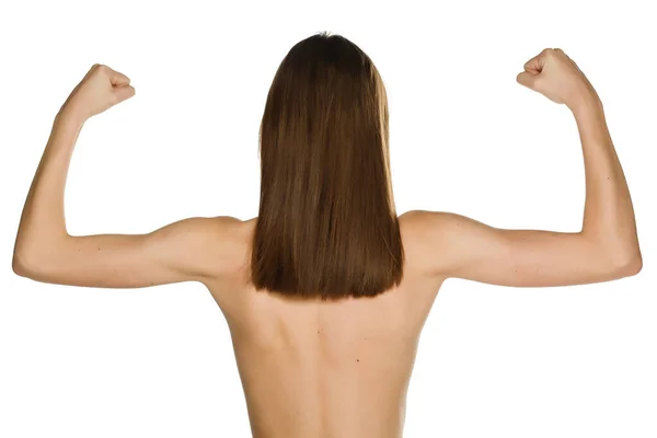Sıska Bir Kadının Beyaz Arka Planda Kollarını Göstermesi Nadir Görülür — Stok fotoğraf