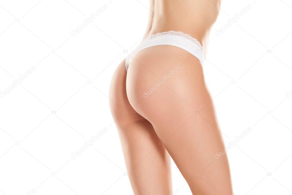 young woman with a pretty ass in white panties