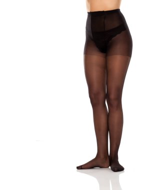 Güzel bayan uzun bacaklar ve beyaz arka planda siyah yüksek bel naylon çoraplar.