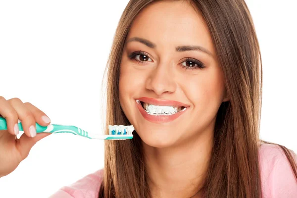 Joven Mujer Cepillándose Los Dientes Cepillo Dientes Sobre Fondo Blanco —  Fotos de Stock