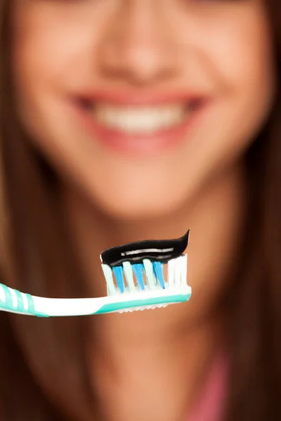 Young Woman Holding Tooth Brush Black Active Charcoal Toothpaste White — Stock Photo, Image