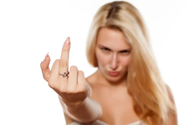 Young Blonde Woman Showing Middle Finger — Stock Photo, Image