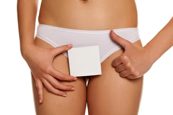 Woman Panties Cowers Her Vagina Empty Sheet Paper White Background — Φωτογραφία Αρχείου