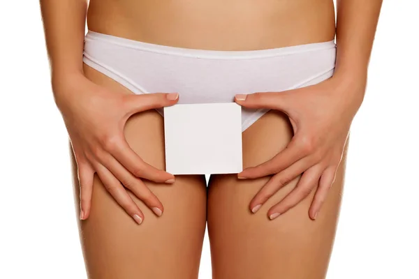 Woman Panties Cowers Her Vagina Empty Sheet Paper White Background — Stock Fotó