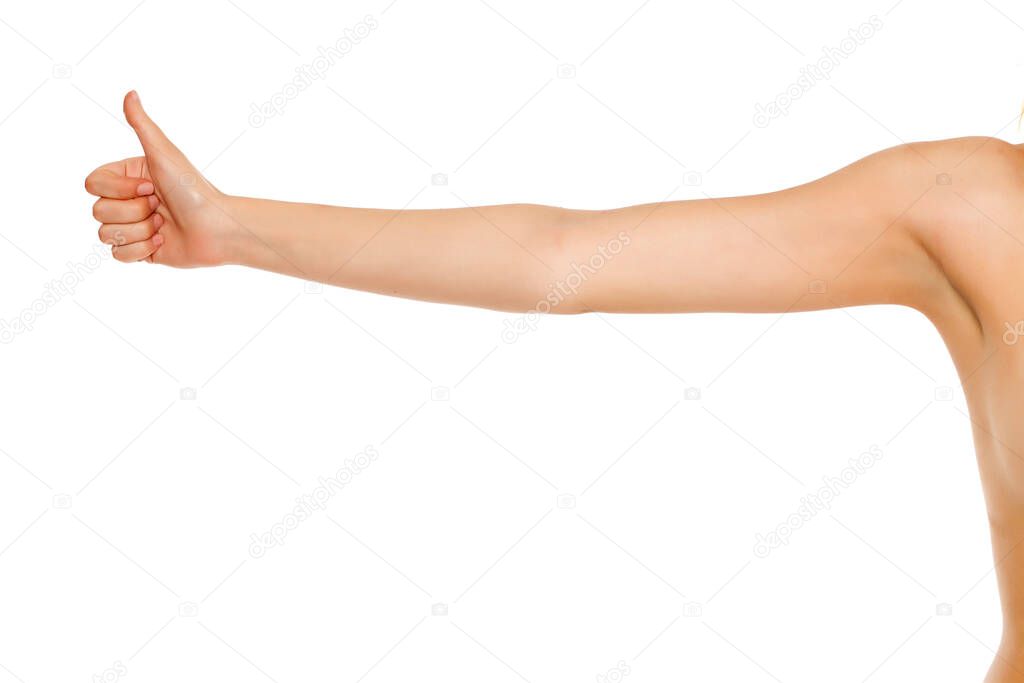 whole female arm with thumbs up on white background
