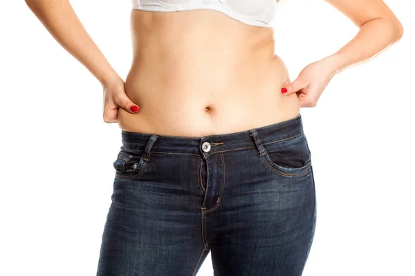 Young Woman Pinching Her Fat Her Waist White Background — Stock Photo, Image