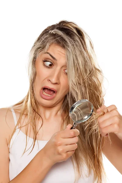 Shocked Blond Woman Messy Wet Hair Looking Her Split Ends — Stock Photo, Image