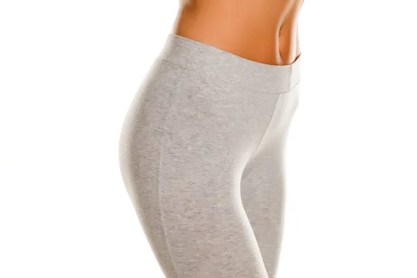Sexy Slim Female Hips Gray Leggingss White Background — Stock Photo, Image