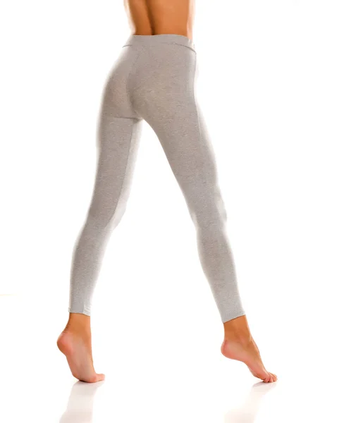 Sexy Slim Fêmea Nádegas Pernas Leggingss Cinza Fundo Branco — Fotografia de Stock