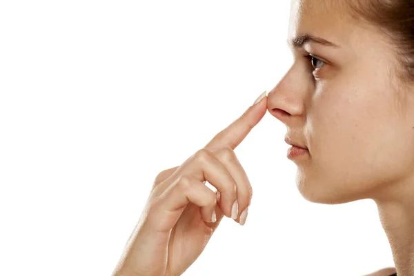 Profile Young Woman Touching Her Nose White Background — Stock Photo, Image