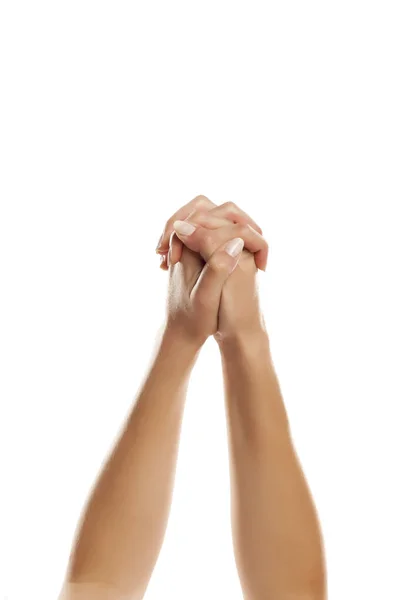 Close Mãos Femininas Segurando Uns Aos Outros Fundo Branco — Fotografia de Stock