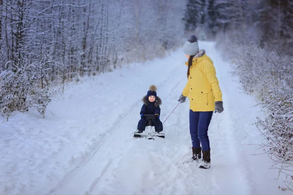 Mother Riding Happy Son Sledge Outdoors — Stock Photo, Image