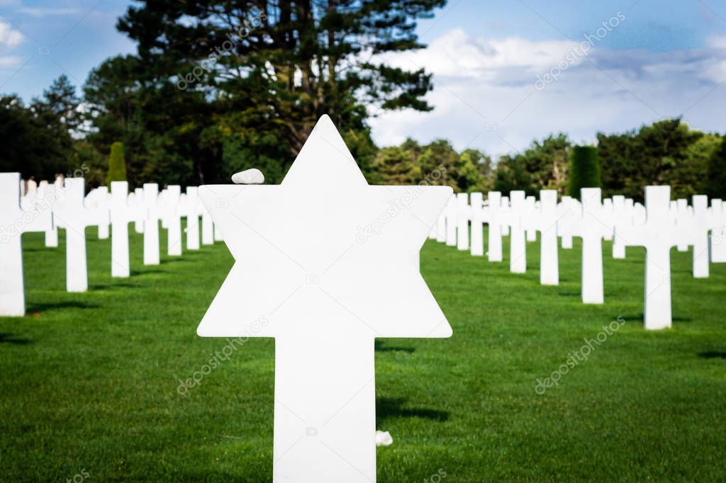 Star of David at the start of a row of white crosses in American War Cemetery near Omaha Beach, Normandy (Colleville-sur-Mer), France