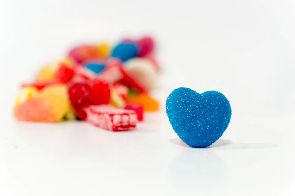 Candy Valentines Hearts. Mixed colorful candies isolated on white background. Close up.