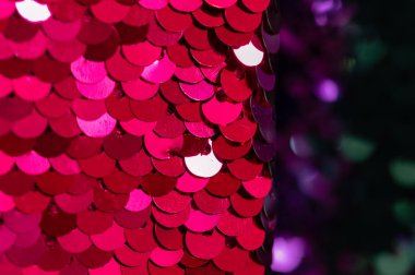 Arka plan payat Glitter arka plan yanıp sönen ışıklar ile. Parlak renklerde payetler yakın