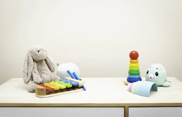 Background of Colorful Children's toys against the wall Toys on Wood Table with Copy Space for Text — Stock Photo, Image