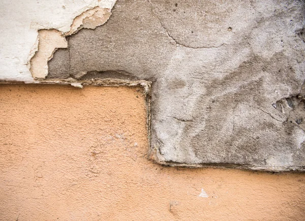 stock image Old paint on the concrete wall 