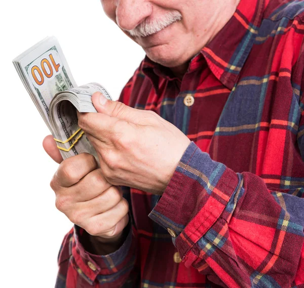 Senior man holding a stack of money. Portrait of an excited old — Stock Photo, Image