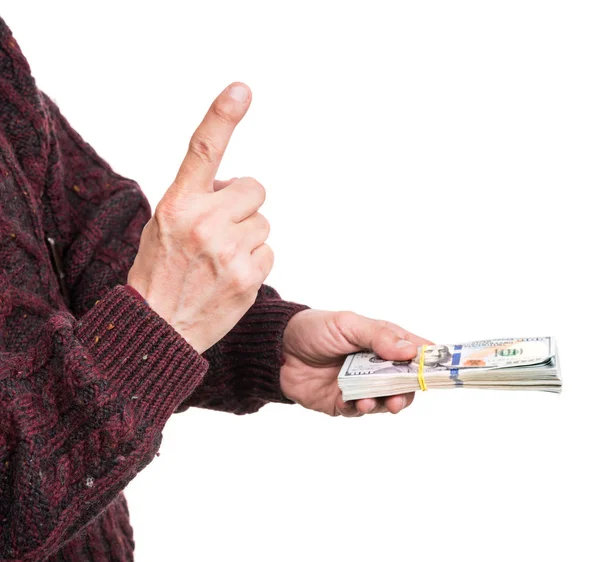 Hombre sosteniendo paquete de billetes de dólar — Foto de Stock