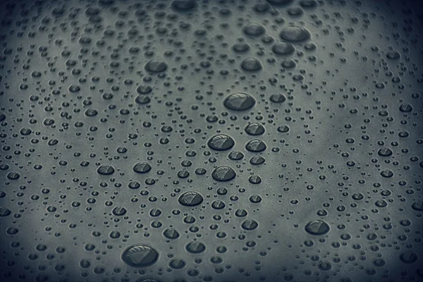 Närbild vatten droppar på metallyta kan användas för webbdesign — Stockfoto