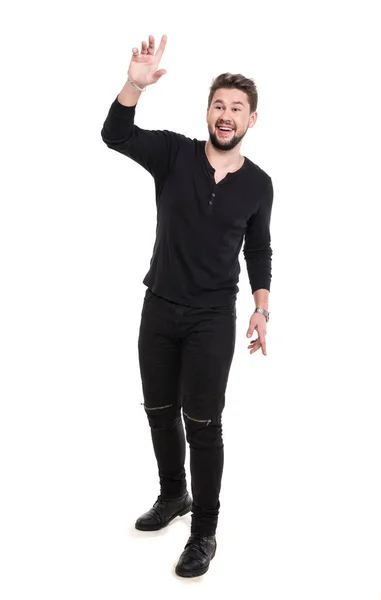 Smiling handsome young man posing in studio — Stock Photo, Image