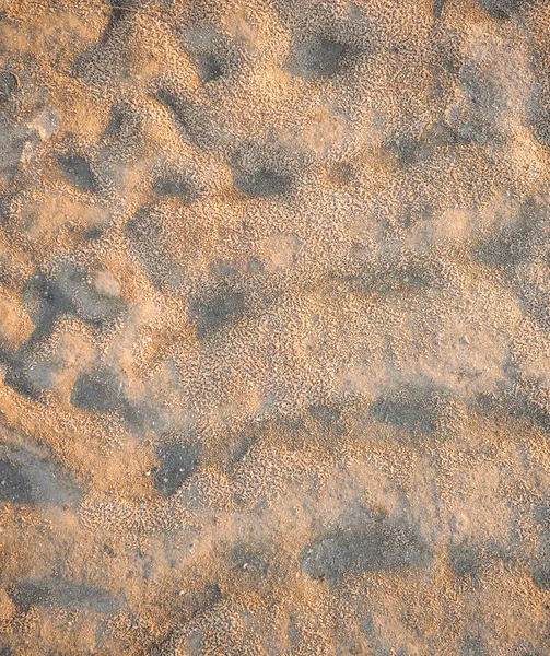 Ondas en textura de fondo de arena húmeda. Playa arena fondo —  Fotos de Stock