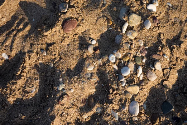 Textura de fundo de areia ao pôr do sol — Fotografia de Stock