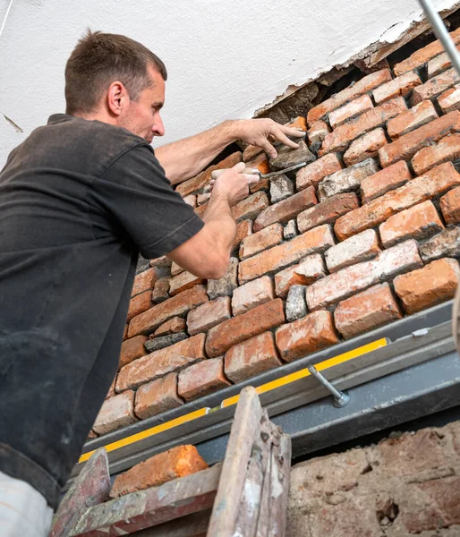 Man Worker Reconstructing Old Stone Wall Old House Reconstruction Repair — Stock Photo, Image