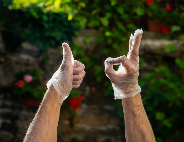 Man Disposable Gloves Outdoors Male Showing Sign — Stock Photo, Image