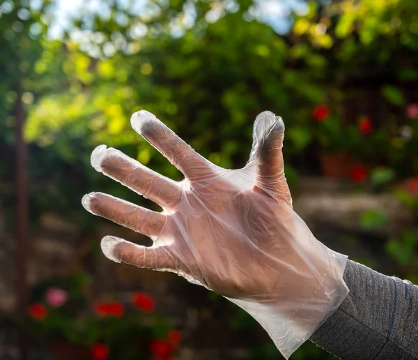 Male Hand Polyethylene Glove Outdoors — Stock Photo, Image