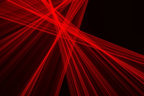 Abstracte Rode Lijnen Getekend Door Licht Een Zwarte Achtergrond Laserlijnen — Stockfoto