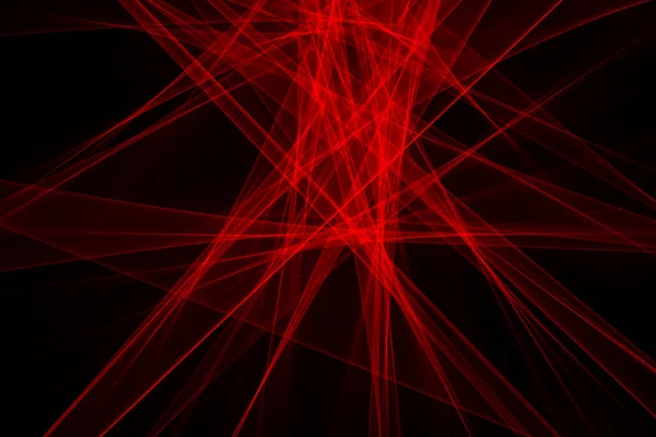 Abstract red lines drawn by light on a black background. Laser lines