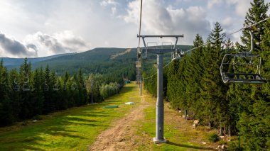 Summertime in the mountains where the ski lift allows for beautiful views. Karpacz, Kopa, Poland.