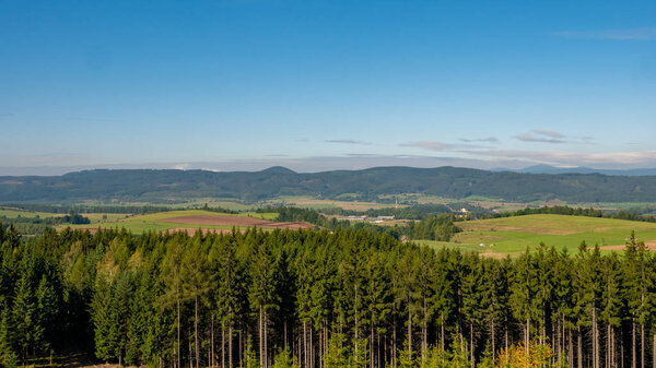 Green forest of pine tree and mountain landscape. Giant Mountains, Karkonosze, Sudets/Sudety, Poland. Late summer.