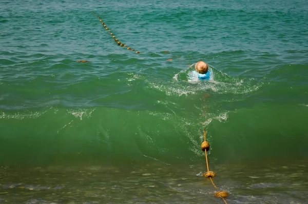 Child in the sea