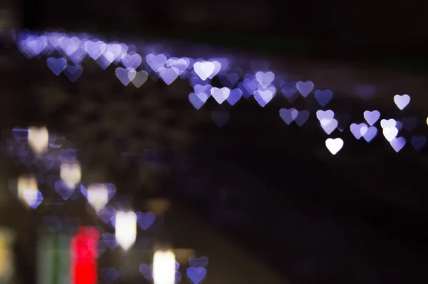 Bokeh garland kalp salonu penceresi vitrin parlama arka plan doku defocus