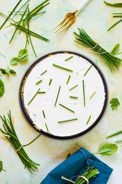 Salty cheesecake with chives — Stock Photo, Image