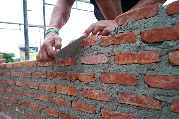 Worker Uses Trowel Installing Red Bricks Wall House Construction — Stock Photo, Image