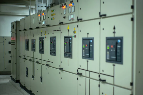 Closeup lighting indicator on the control cabinet in the electrical room.