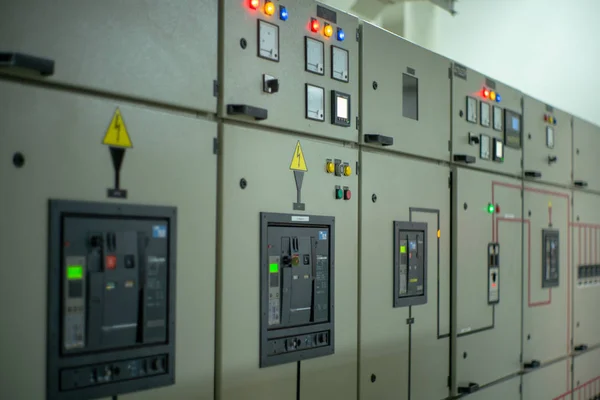 Closeup lighting indicator on the control cabinet in the electrical room.